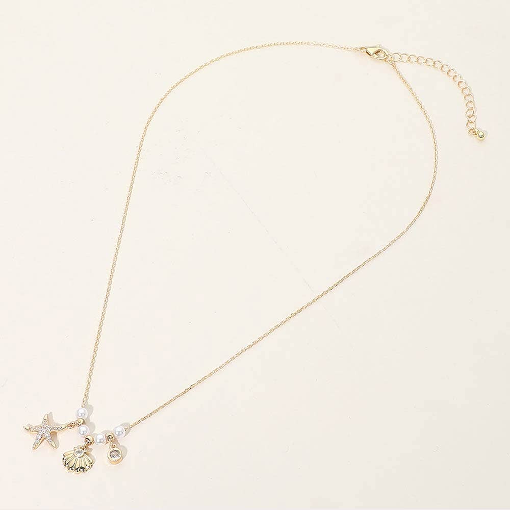 SECRET BOX_14K Gold Dipped CZ Pave Starfish Shell Bezel Charm Pearl Beaded Accent Necklace