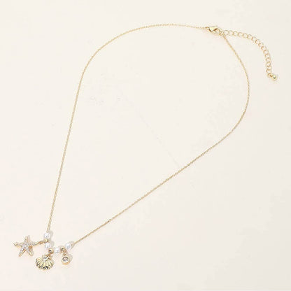 SECRET BOX_14K Gold Dipped CZ Pave Starfish Shell Bezel Charm Pearl Beaded Accent Necklace
